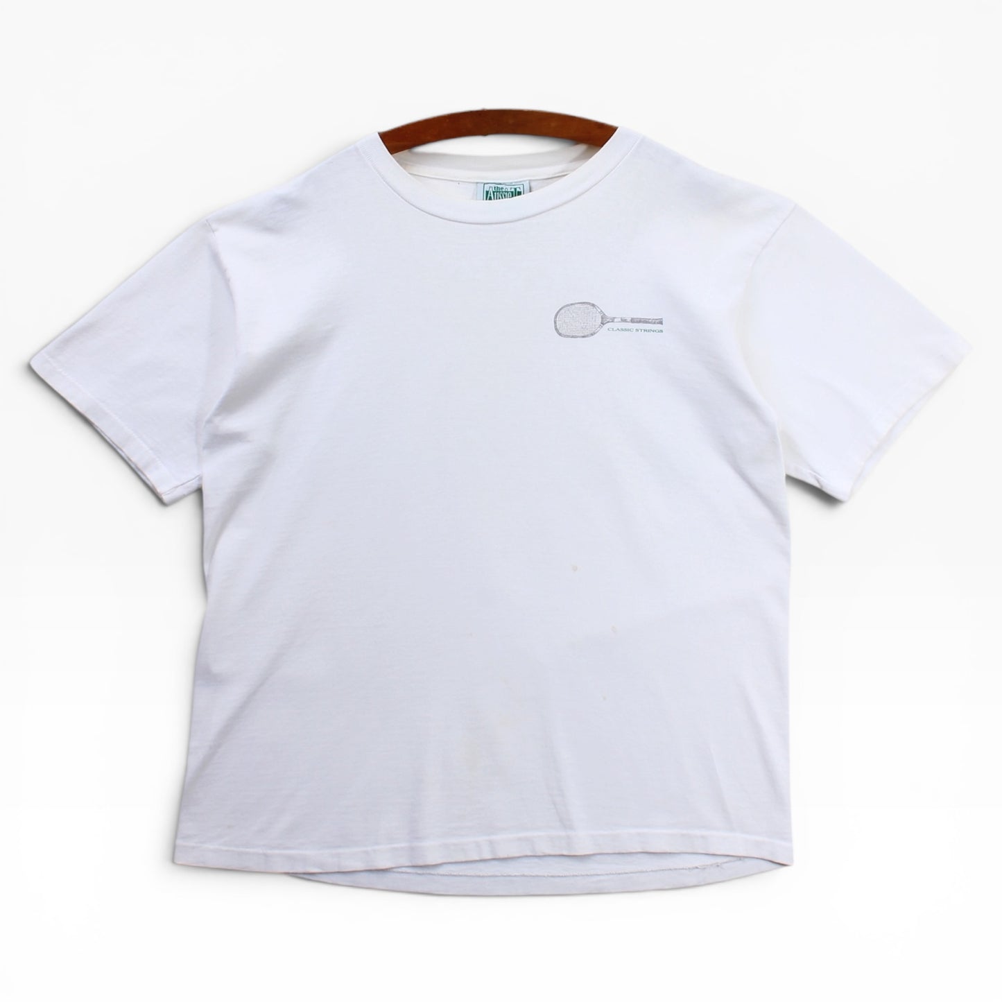 90s Evolution of a classic tennis shirt medium
